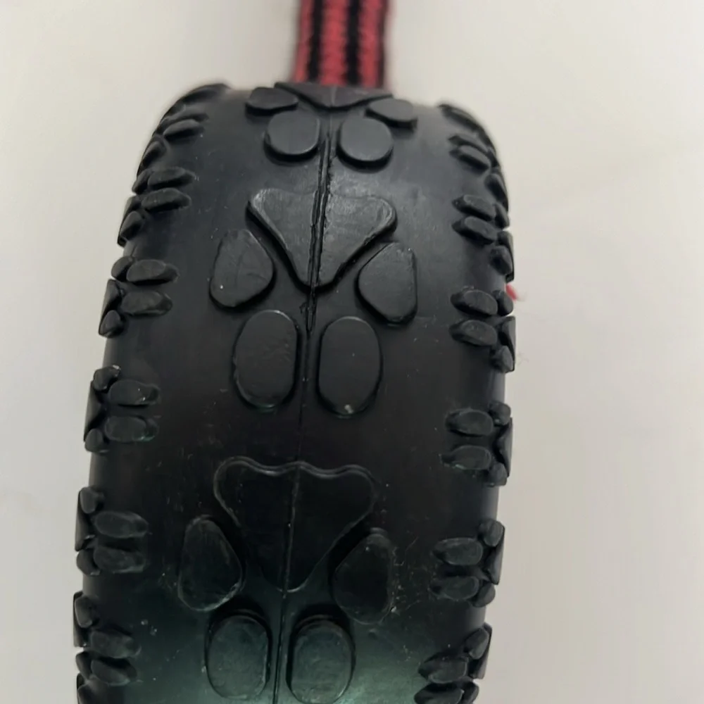 Mammoth Tire Biter Black Tire w/attached Red & Black Knotted Rope For Tugging.